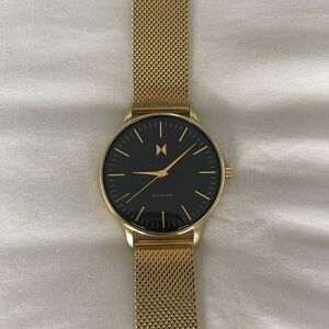 Gold MVMT watch